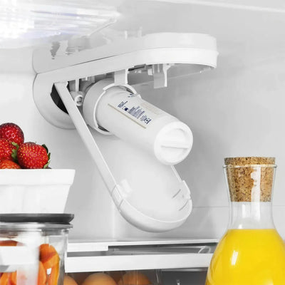 White refrigerator door organizer with items inside a refrigerator